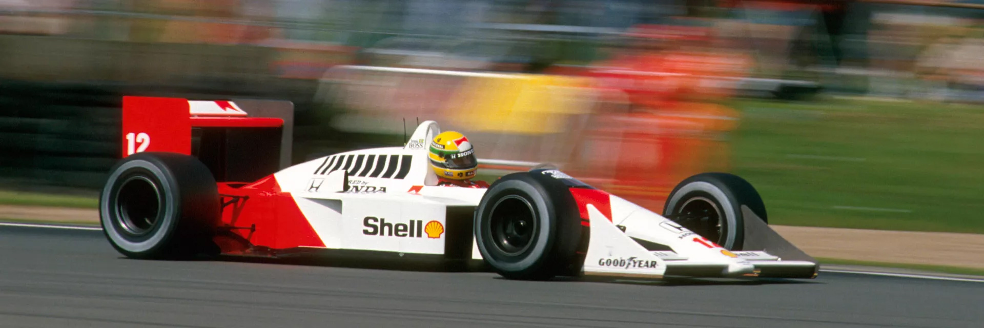 A dynamic action shot of a classic McLaren Honda Formula 1 car, from ...