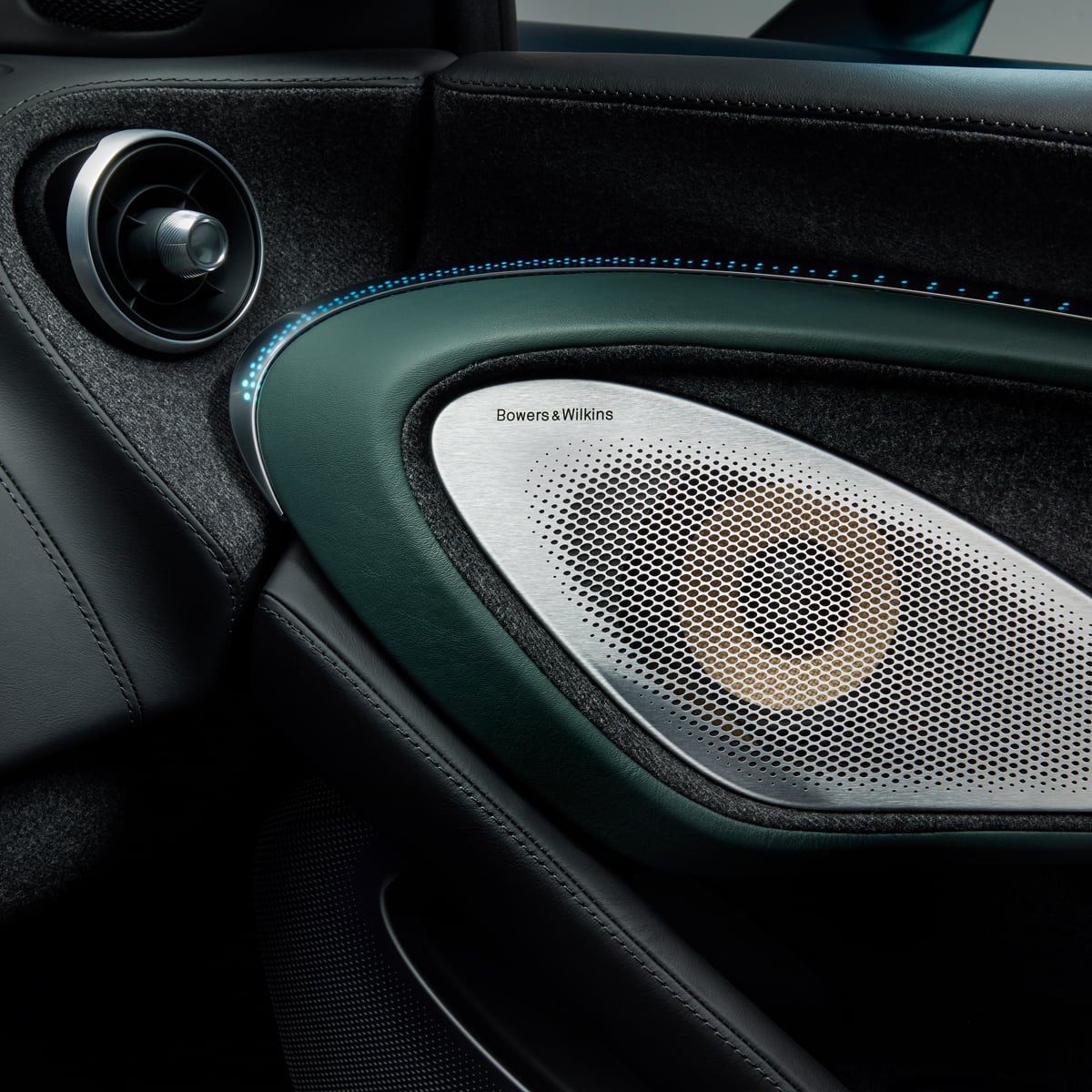 Close up of custom green Bowers & Wilkins speakers in McLaren Verdant theme GT.