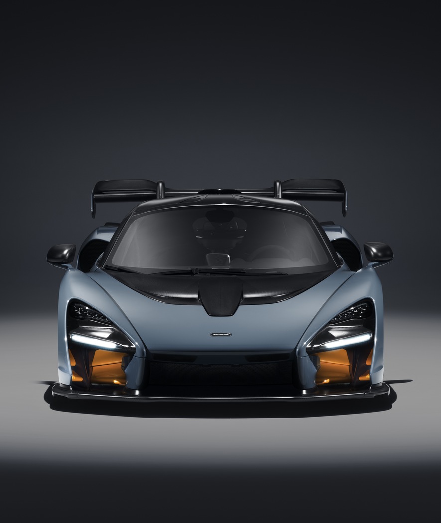 The McLaren Senna showcased in a front-on studio shot, highlighting its extreme aerodynamic bodywork and aggressive design.