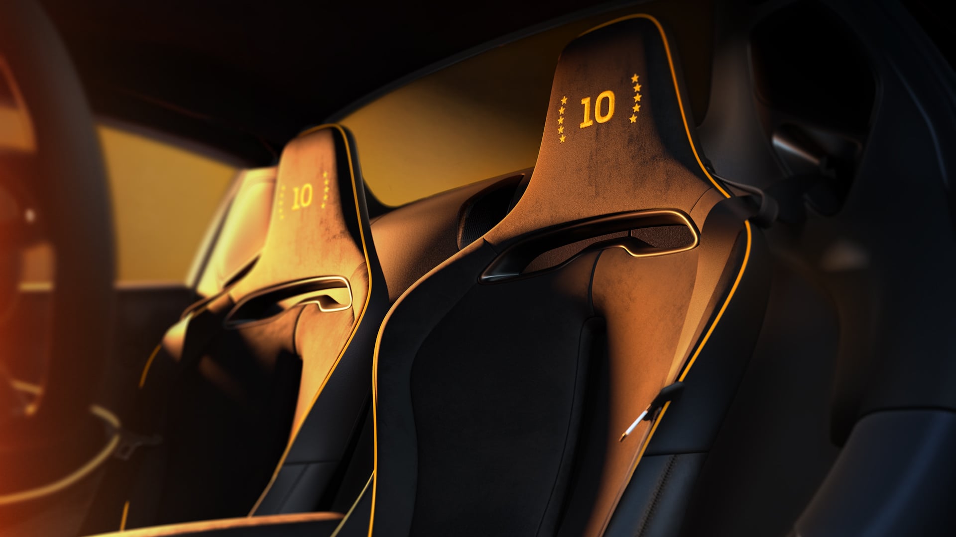 The McLaren MCL39 Celebration Edition Artura Spider sears with 10th’ motif stitched in Myan Orange thread on both headrests.