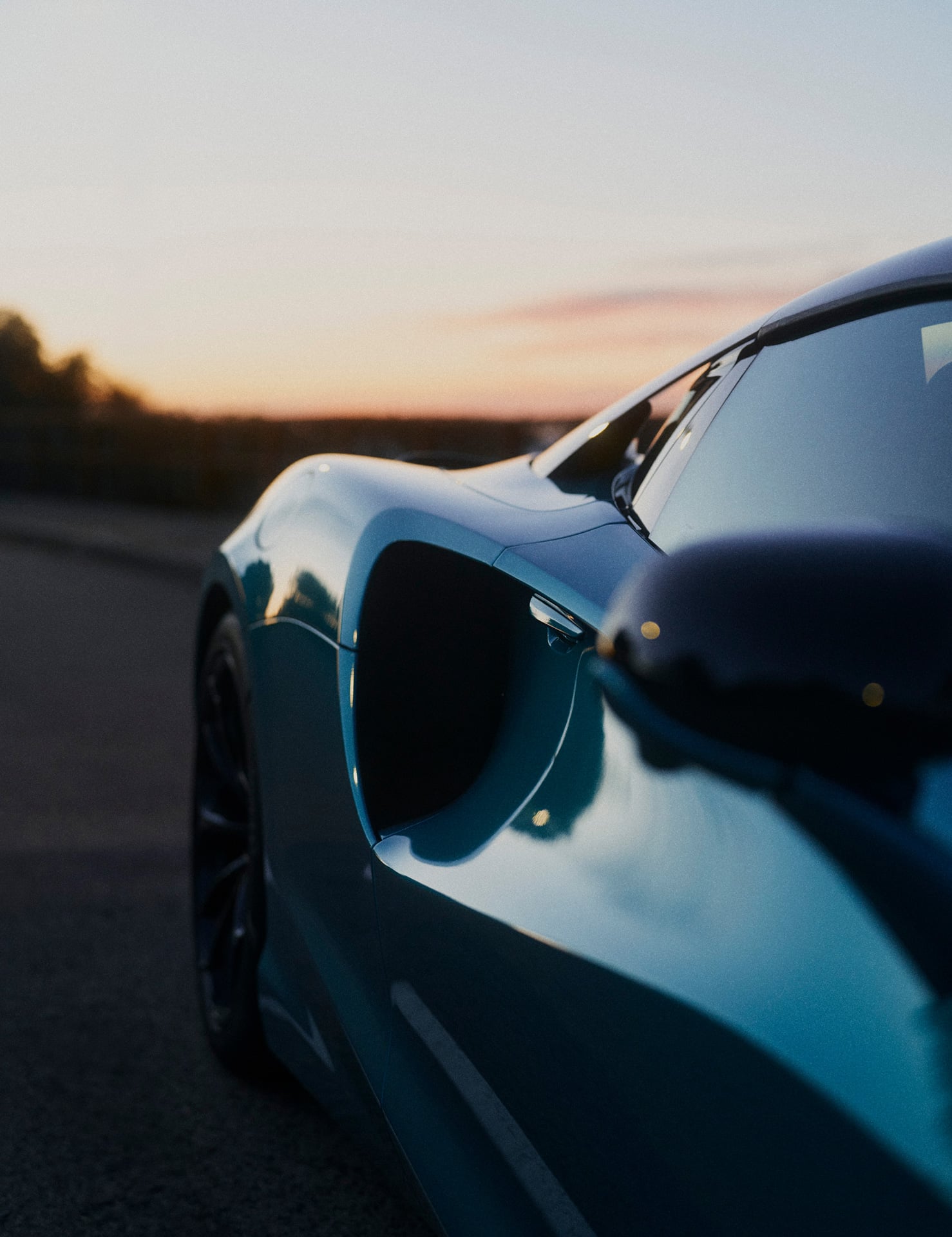 Side view of a McLaren Artura Spider focusing on the side air vent.